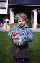 [photo of
Eliott in our garden at home]